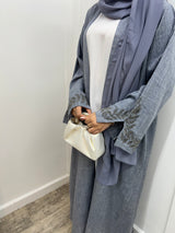 Daania - Embellished linen abaya.